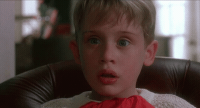 Young Boy Sitting In Chair With Mouth Open GIF