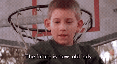 Young Boy Sitting In Front Of Basketball Hoop Talking About Future GIF