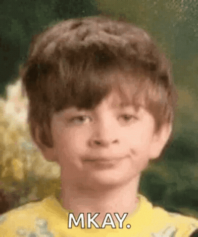 Young Boy Smiling And Making Funny Face GIF
