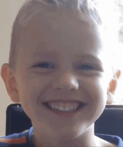 Young Boy Smiling Close Up GIF