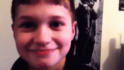 Young Boy Smiling Close Up GIF