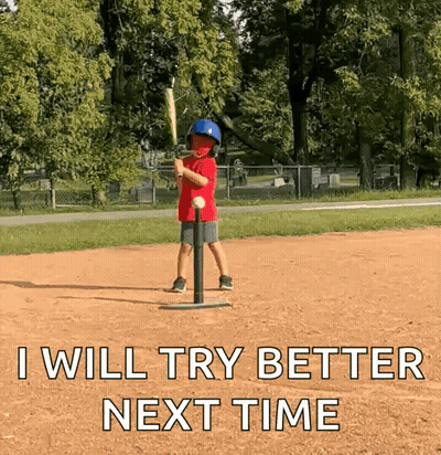 Young Boy Swinging Bat At Baseball On Tee GIF