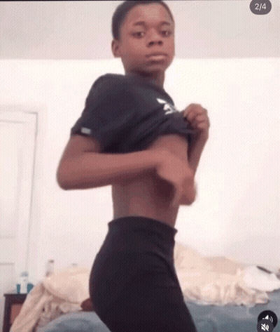 Young Boy Taking Off Clothes GIF