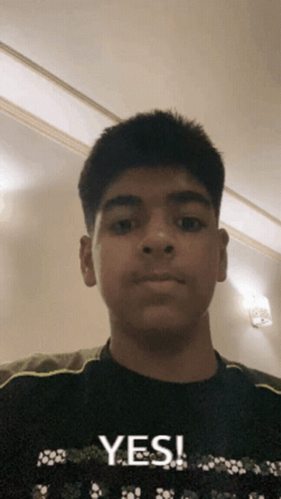 Young Boy Taking Selfie Saying Yes GIF