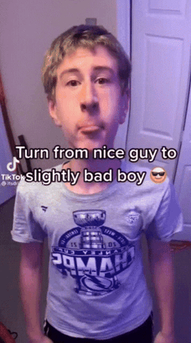 Young Boy Wearing Shirt That Says Poman GIF