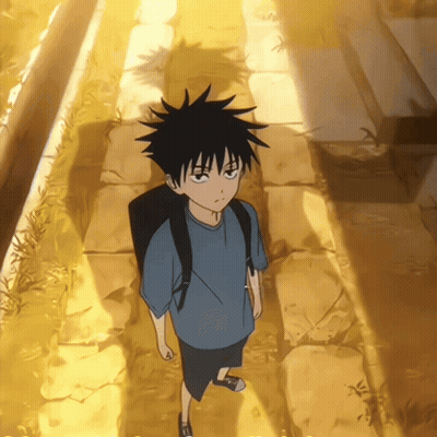 Young Boy With Backpack On Stone Walkway GIF