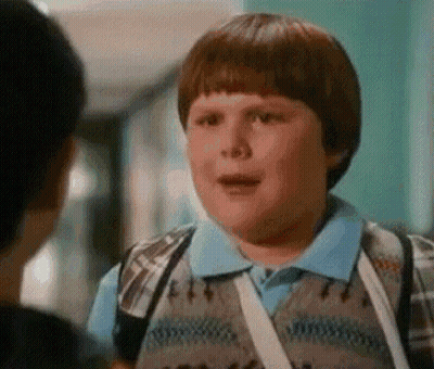 Young Boy With Backpack Talking To Another Boy GIF