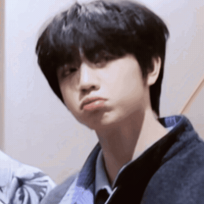 Young Boy With Black Hair Making Funny Face GIF