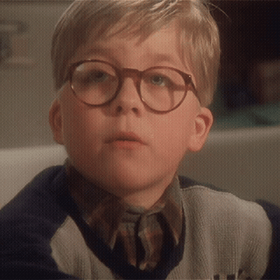 Young Boy With Glasses And Sweater With Letter A GIF