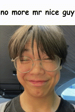 Young Boy With Glasses Making Funny Face GIF