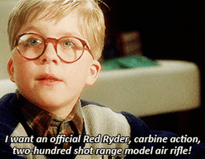 Young Boy With Glasses Says I Want An Official Red Ryder Carbine Action Two Hundred Shot Range Model Air Rifle GIF