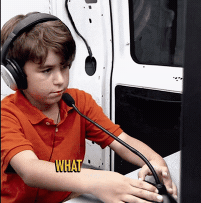 Young Boy With Headphones Holding Microphone Saying What GIF