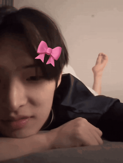 Young Boy With Pink Bow GIF