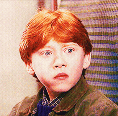Young Boy With Red Hair Looking GIF