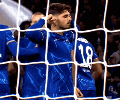 Young Boy With White Hair Holding Blue Ball GIF
