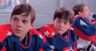 Young Boys In Hockey Jerseys In Locker Room GIF