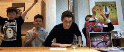 Young Boys Sitting At Kitchen Table GIF