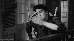 Young Elvis Presley Blowing Kisses GIF