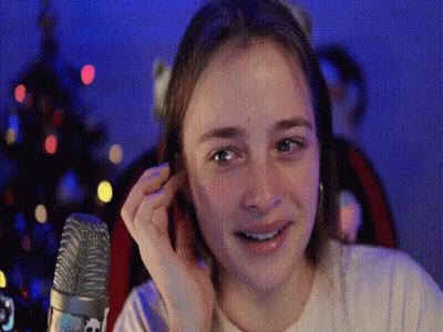 Young Girl Covering Ears At Microphone GIF