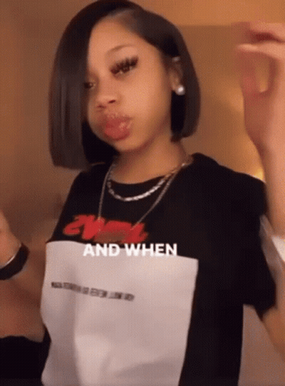 Young Girl In Black And White T-Shirt And Necklace GIF