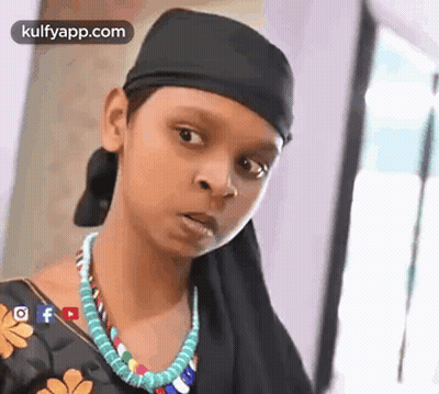 Young Girl In Black Headband Making Funny Face GIF