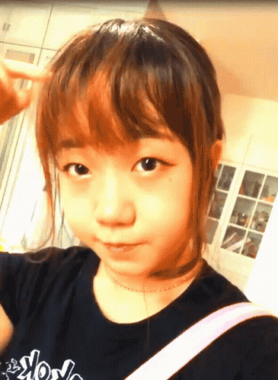 Young Girl In Black Shirt Saying Wow GIF