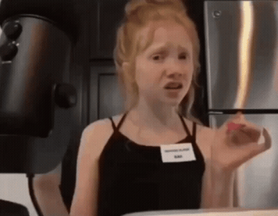 Young Girl In Black Tank Top Singing GIF