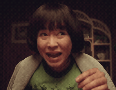 Young Girl In Green Star Shirt GIF