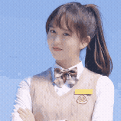 Young Girl In School Uniform With Arms Crossed And Ponytail GIF