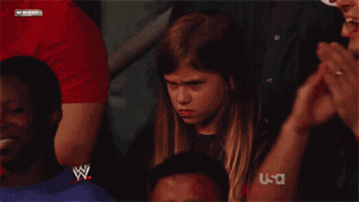 Young Girl In Wrestling Ring With W Logo Shirt GIF