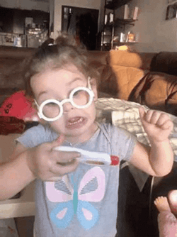 Young Girl Looking At Temperature In Thermometer GIF