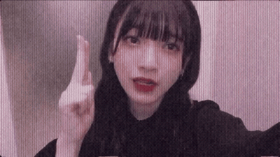 Young Girl Making Funny Face And Pointing Finger GIF
