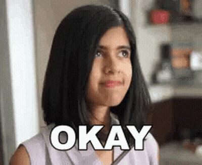 Young Girl Making Funny Face Saying Okay GIF