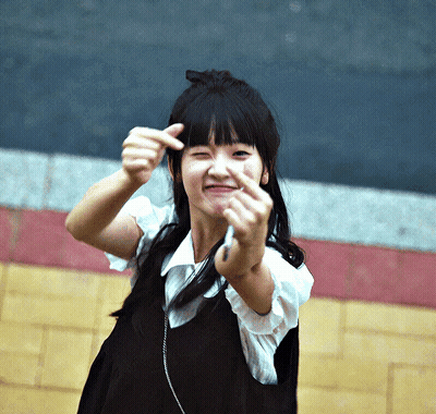 Young Girl Making Funny Face With Hands GIF