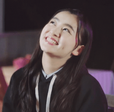Young Girl Smiling And Clapping Hands GIF