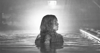 Young Girl Standing In Water GIF