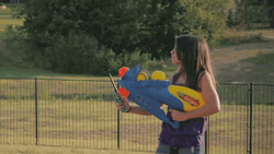 Young Girl Using Flamethrower GIF