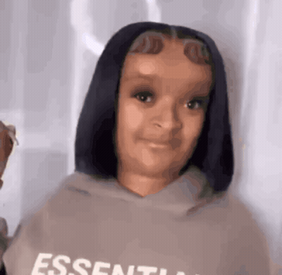 Young Girl Wearing Essentials Hoodie GIF