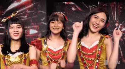 Young Girls Posing One In Gold Top GIF