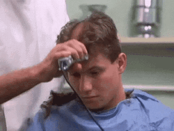 Young Guy Sad During Shaving Of Head GIF