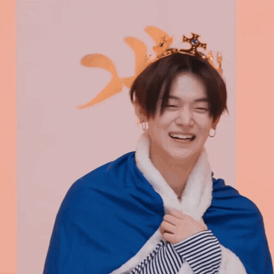 Young Korean Man In Crown And Cape Smiling GIF