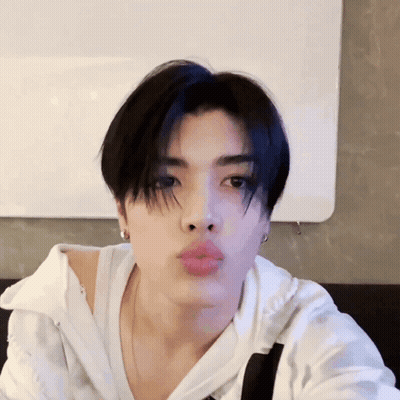 Young Man Blowing Kiss GIF