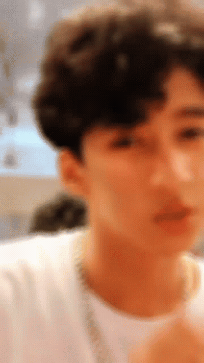 Young Man Close Up In White Shirt GIF