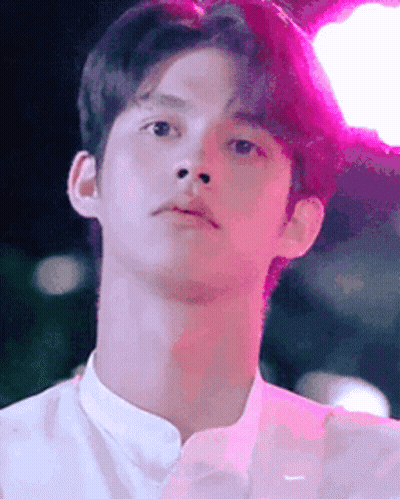 Young Man Close-Up Pink Background GIF
