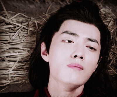 Young Man Close Up With Straw Background GIF