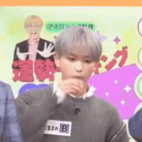 Young Man Covering Mouth GIF