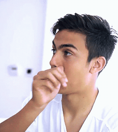 Young Man Covering Mouth With Hand GIF