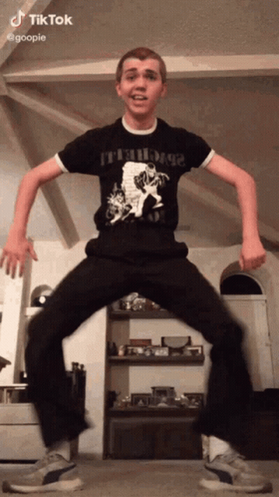 Young Man Dancing In Living Room GIF