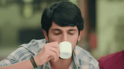 Young Man Drinking Coffee GIF