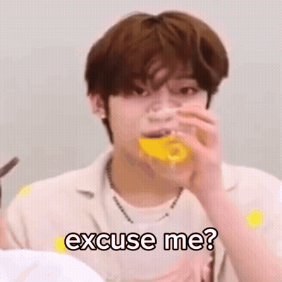 Young Man Drinking Orange Juice Making Funny Face GIF